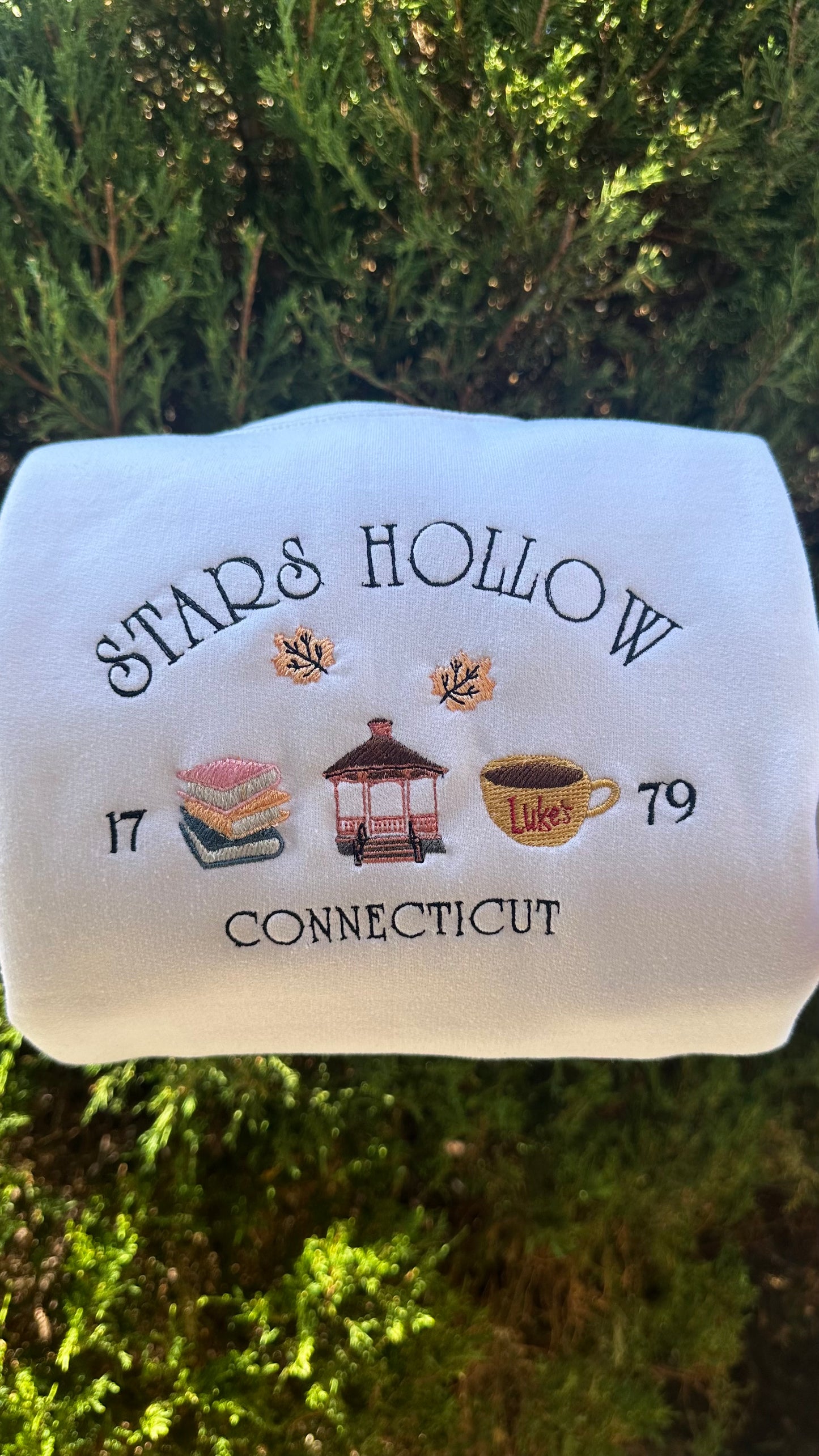 Star hollow embroidered crewneck sweater
